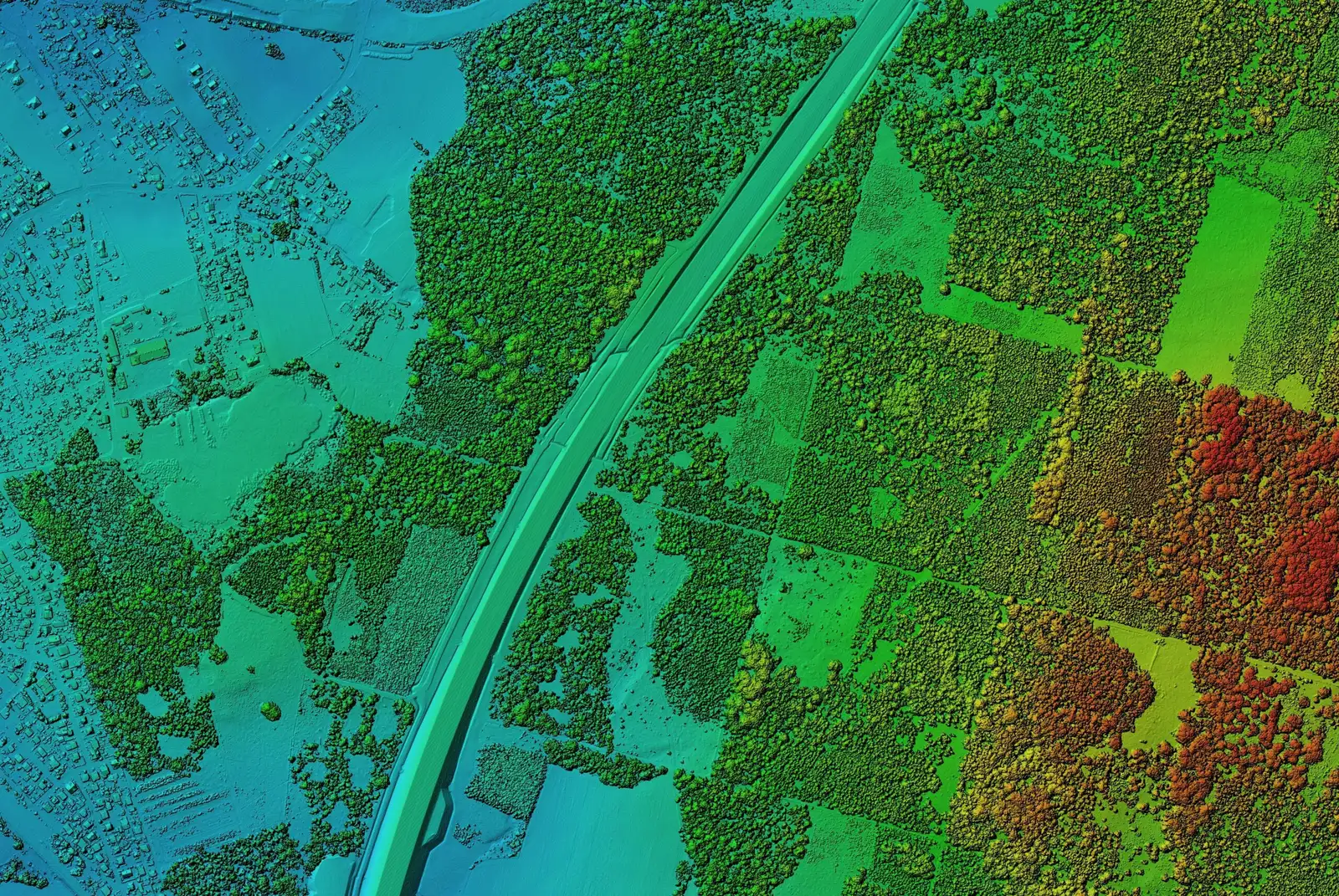 Nube de puntos LiDAR coloreada por elevación sobre campos y caminos